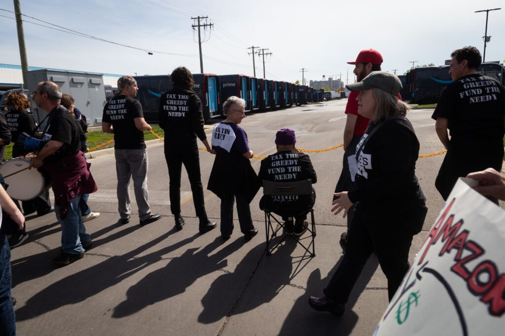 Protesters facing Amazon facility