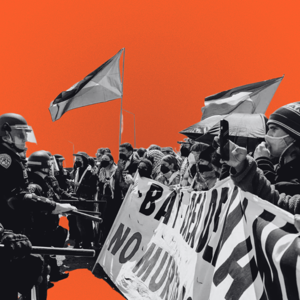 Police officers facing protesters holding banners and flags, with a vivid orange background.